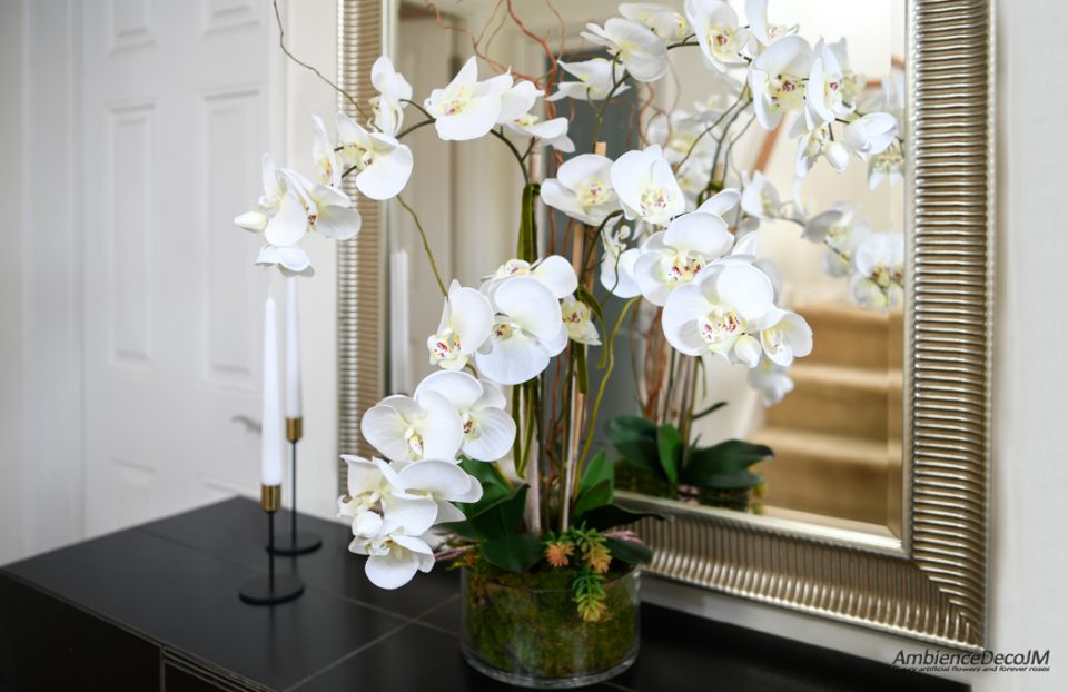 silk orchids in glass dish