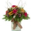 Christmas-centerpiece-in-a-gold-vase