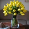 Artificial tulips in a vase