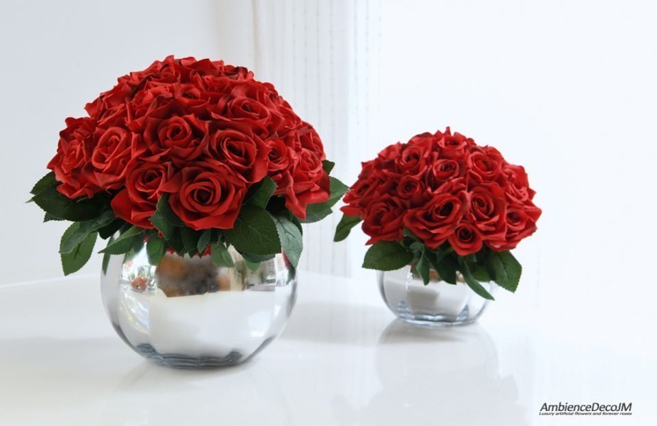 Silk red roses in a vase