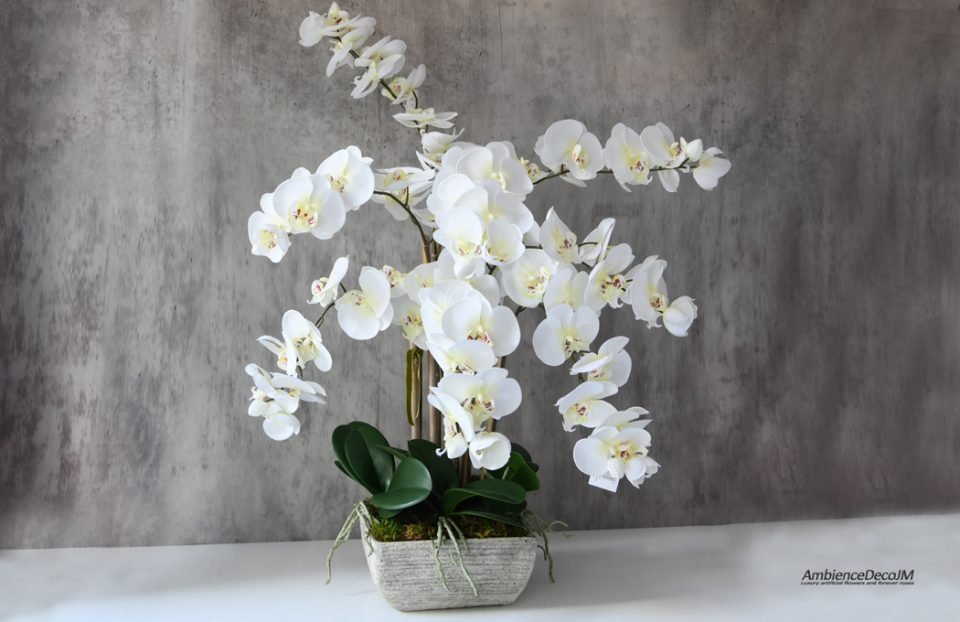 Silk orchids in a concrete pot