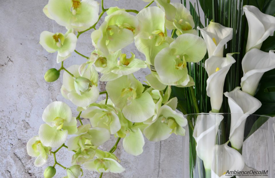 Orchids with calla lily centerpiece