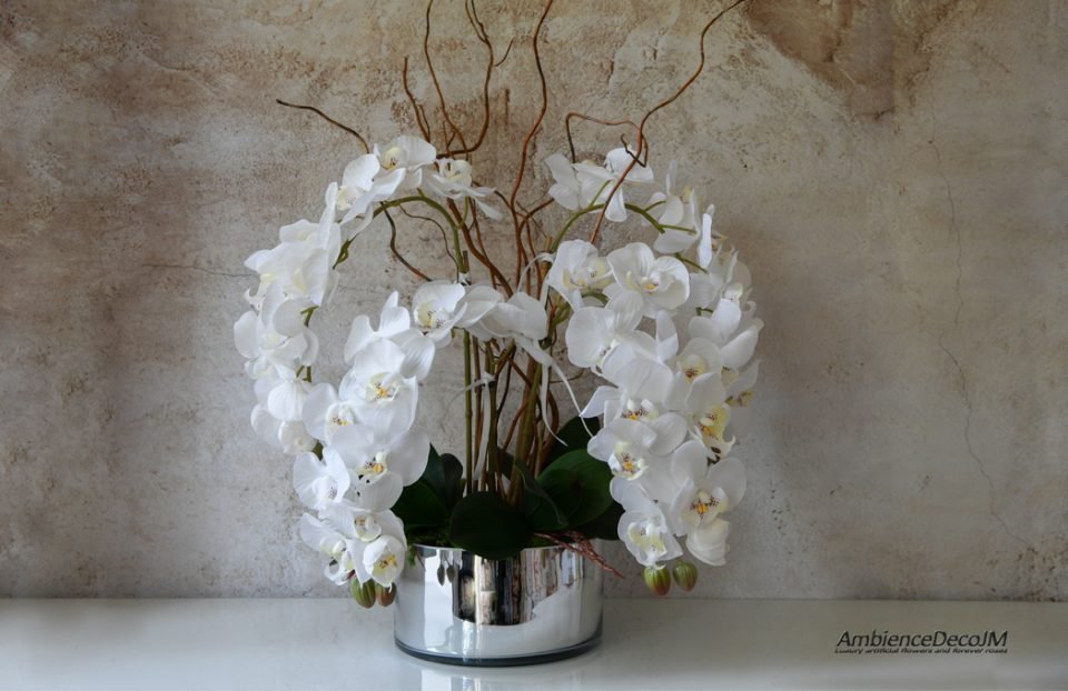 Lifelike orchid and willow arrangement