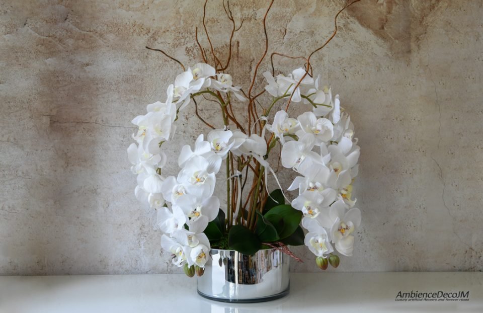 Lifelike orchid and willow arrangement