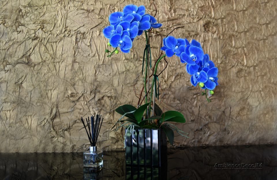 Artificial blue orchid arrangement