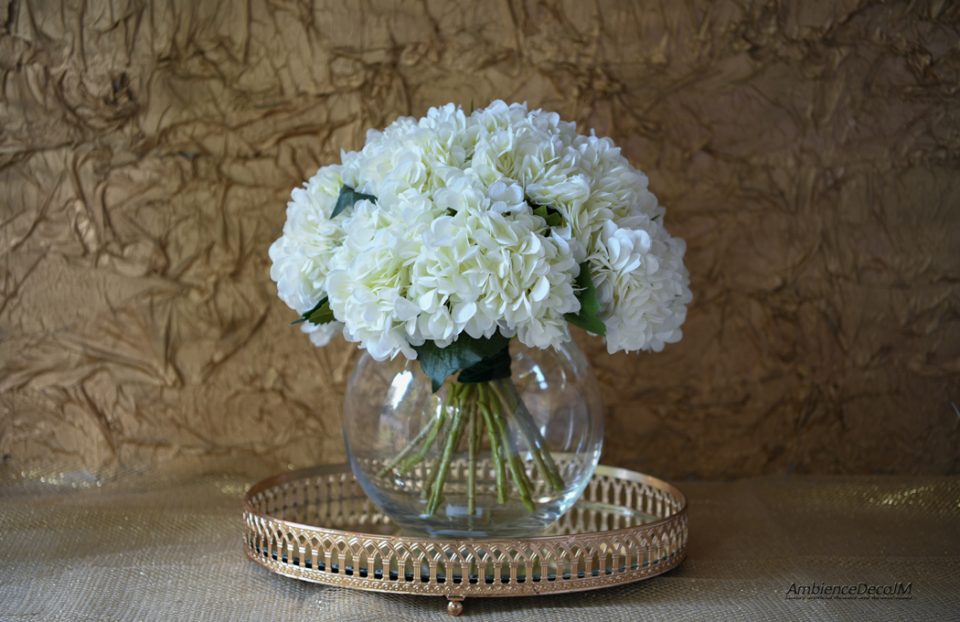 Silk hydrangea arrangement in vase