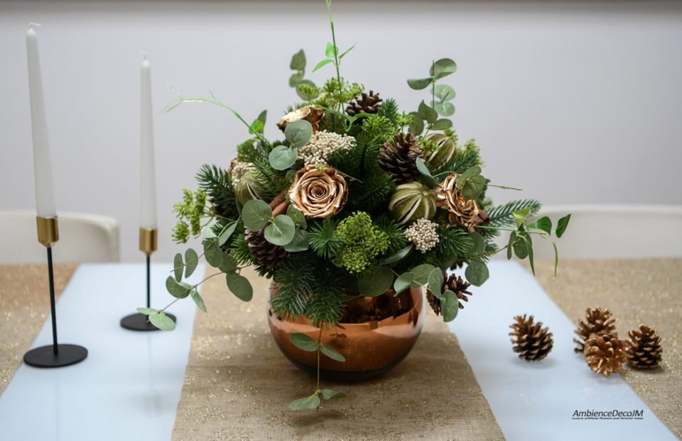 Christmas arrangement in a gold fishbowl