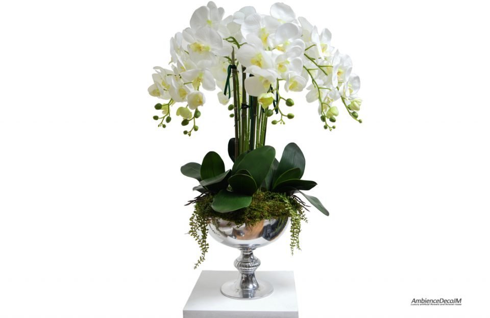 Silk orchids in a pedestal bowl