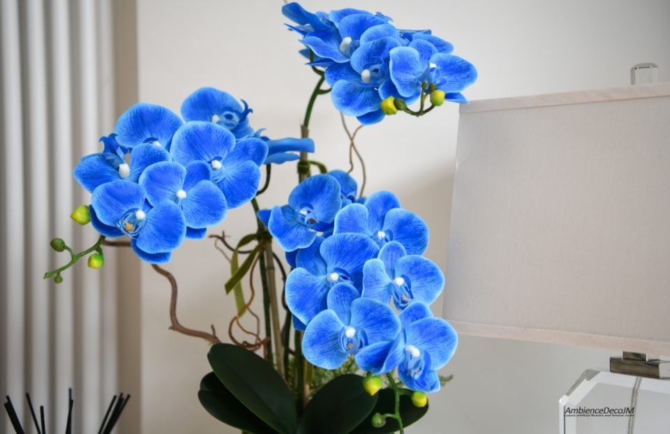 Faux Blue Orchids in a fishbowl