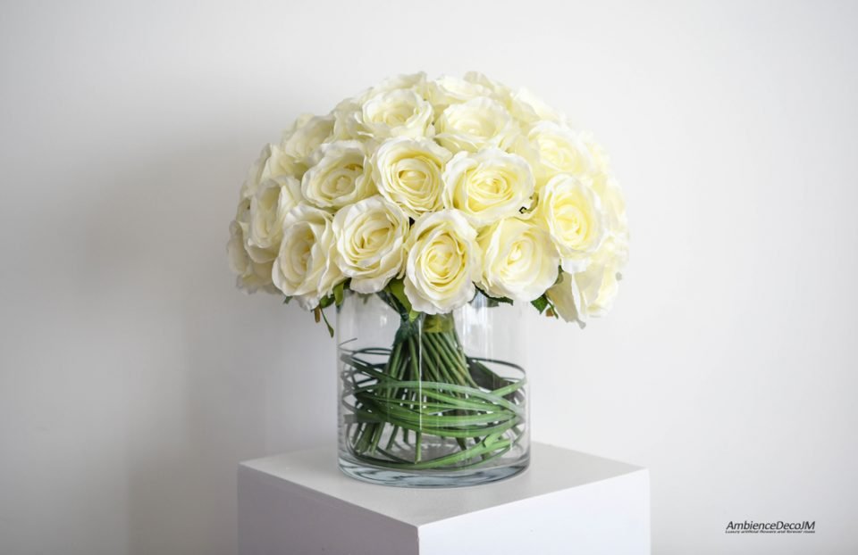 Silk roses in a cylinder vase