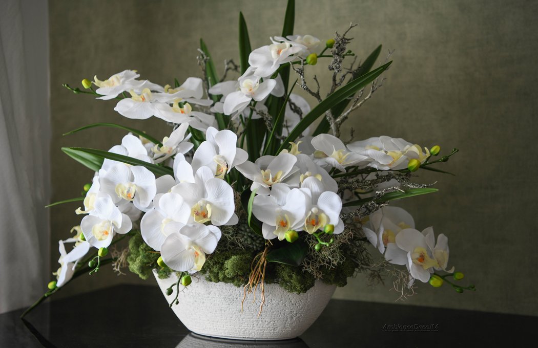 Dining table white orchid arrangement