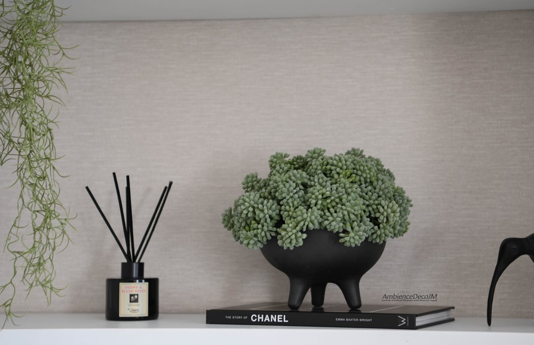 Luxury artificial succulent arrangement with sage-green foliage in a black footed bowl